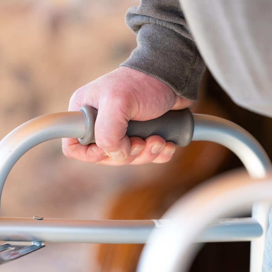 Elderly Man Using Walker